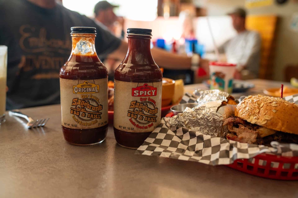 House barbecue sauces on the table at Sagebrush BBQ & Grill