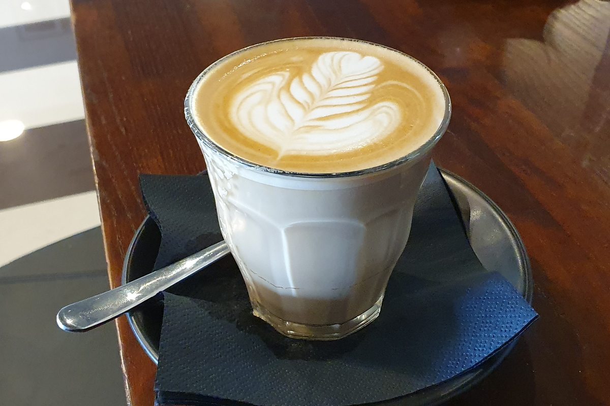 Illustrative photo of a latte with poured art
