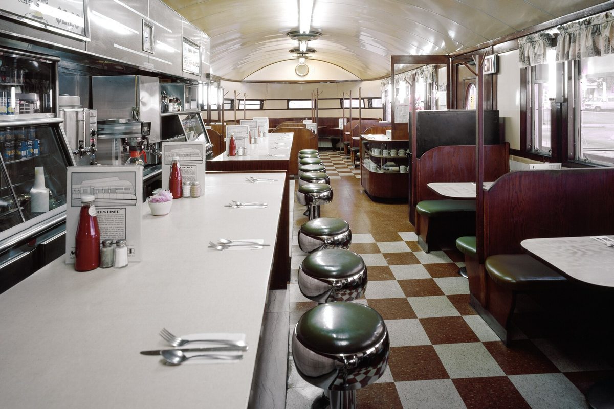 Illustrative photo of a classic American diner counter and booths